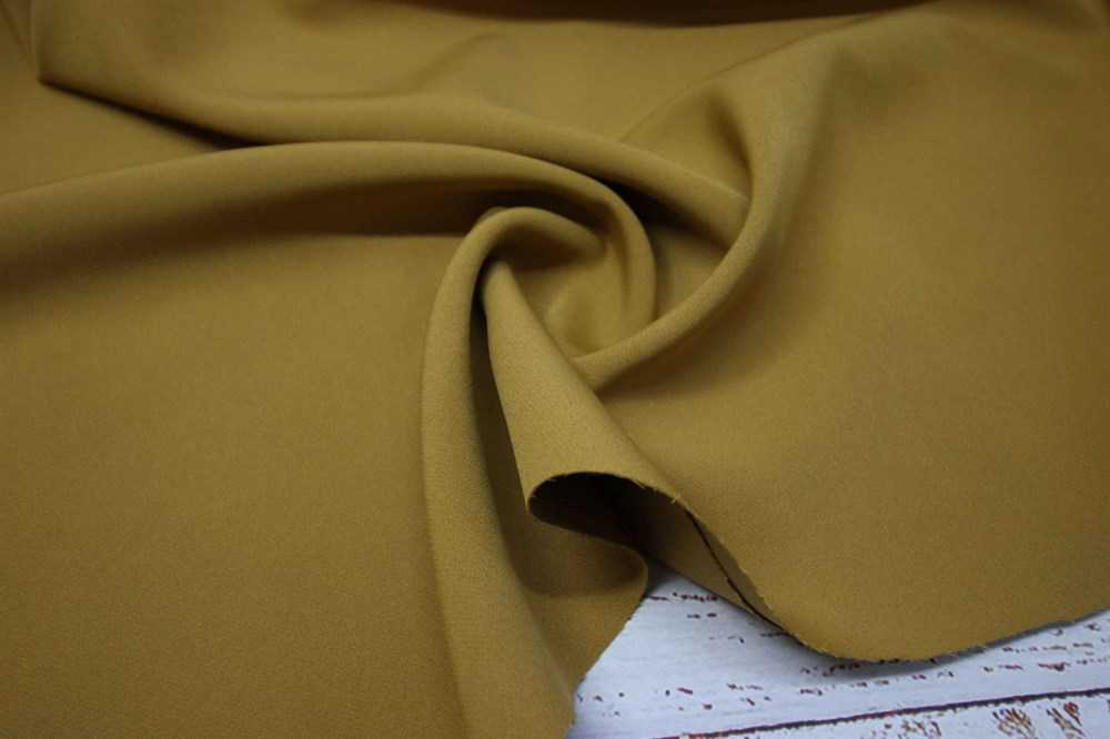 Ткань барби относительно новый материал Это двухсторонний креп, который относят к костюмно-плательнымМатериал может отличаться по составу, имеет много