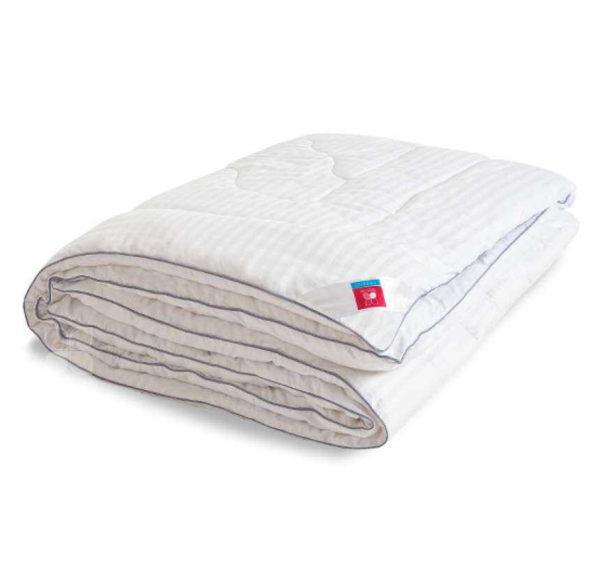 Для спокойного сна необходимы качественные постельные принадлежности Тяжёлое одеяло из шерсти мериноса приносит комфорт и приятные ощущения Под ним человек